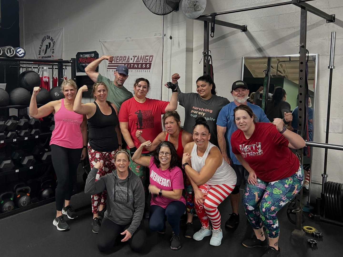 Sierra Tango Fitness members celebrating together inside the gym