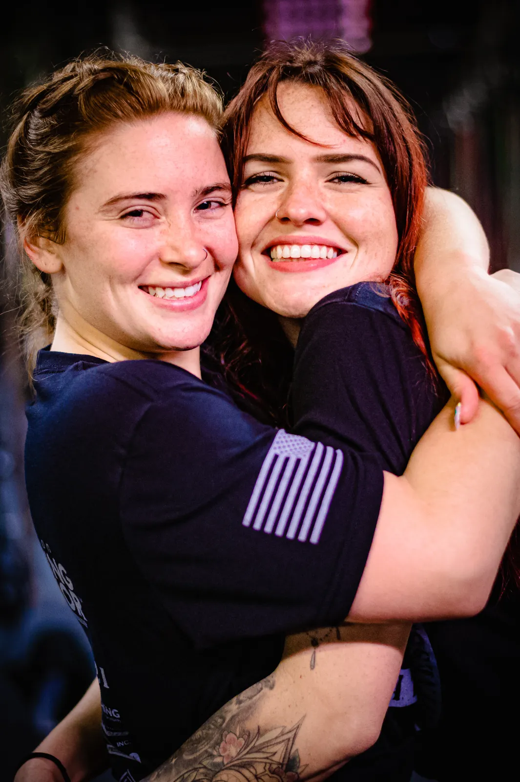 Two Sierra Tango members embracing